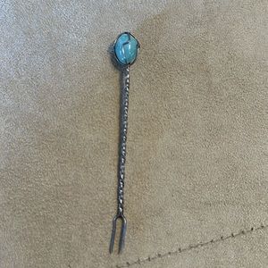 Silver vintage olive fork with stone